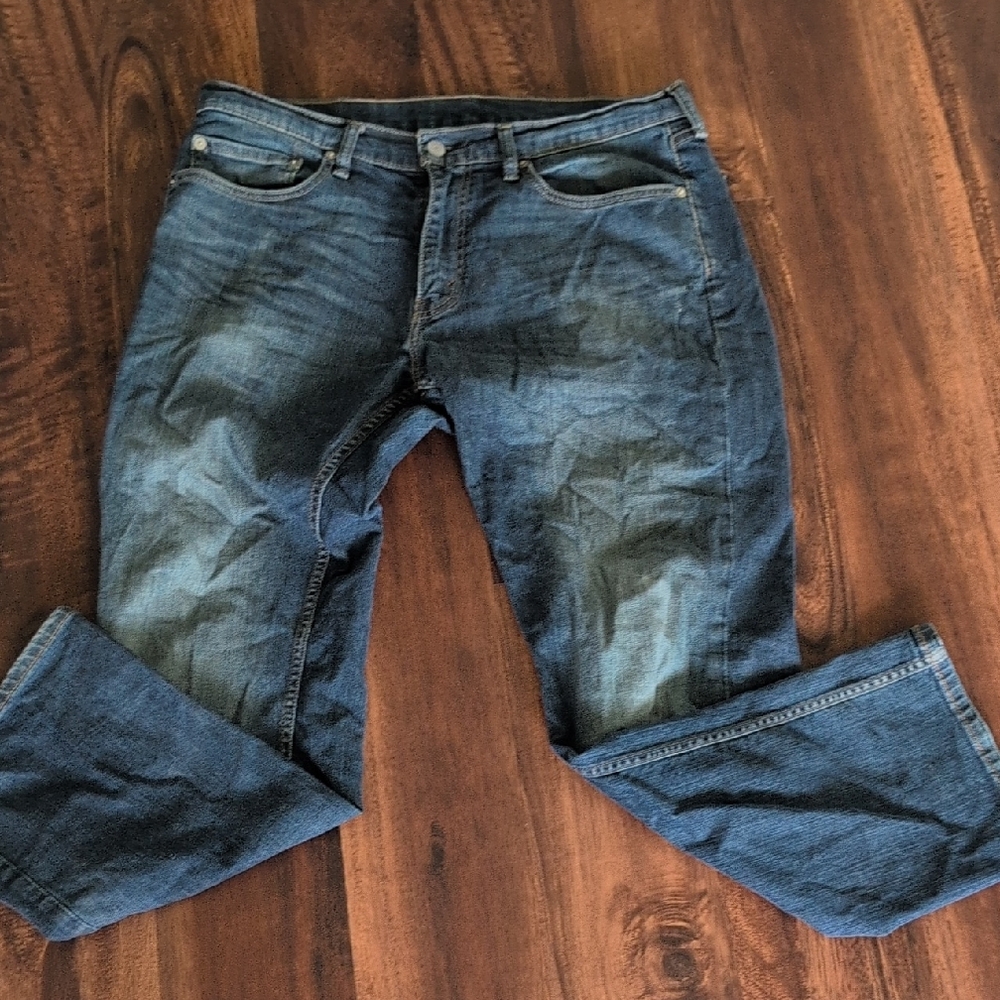 Levi's Relaxed Medium to Dark Wash Jeans with Natural Fading 559